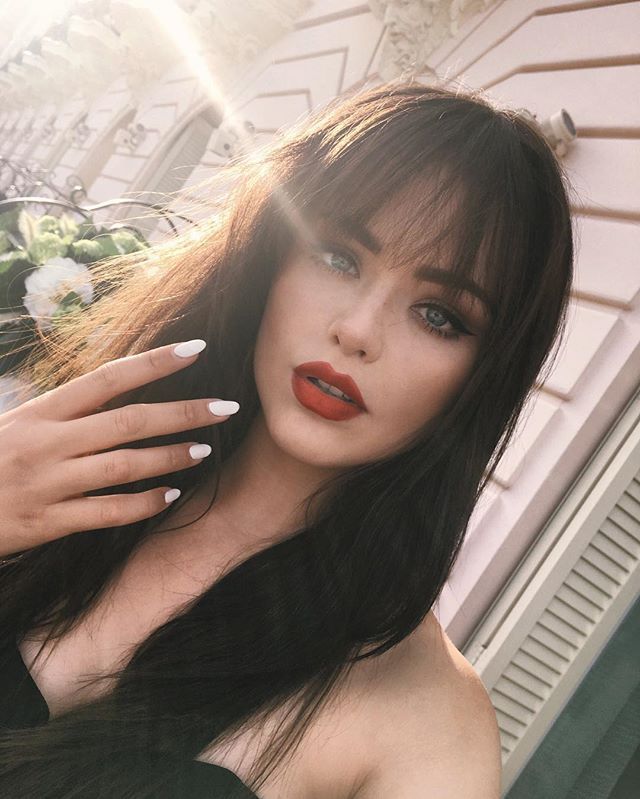 beauty hair brown hair with bangs long hair white nails red lipstick bangs how to wear your bangs more on fashionchick